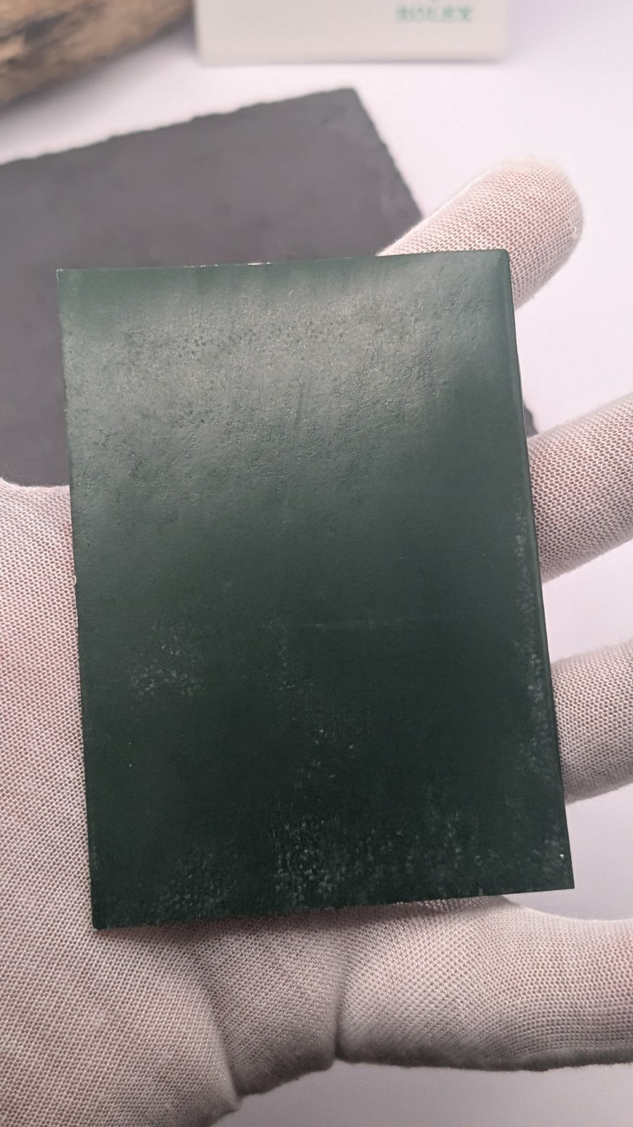 Genuine Rolex booklet holder in green PVC, designed to store warranty booklets,